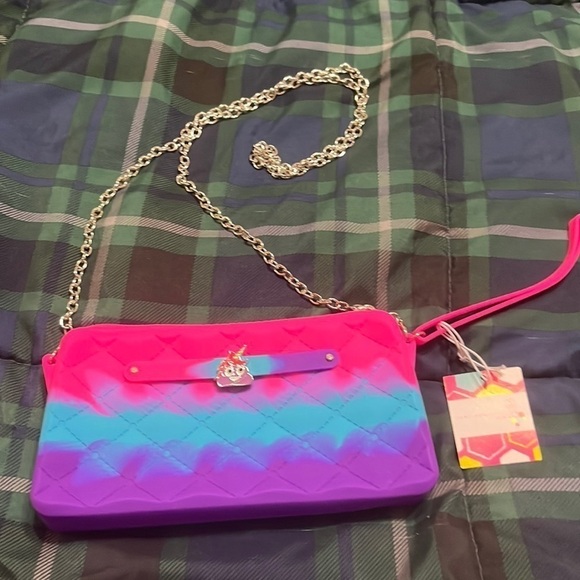just beautiful Handbags - NWT Waterproof, eco-friendly, wristlet/wallet.
silicone with chain